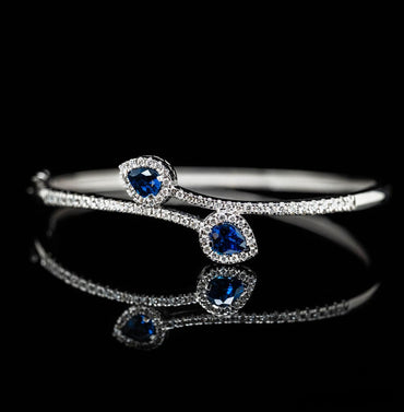 Elegant Pear-Cut Sapphire & Diamond Halo Bypass Bangle Bracelet