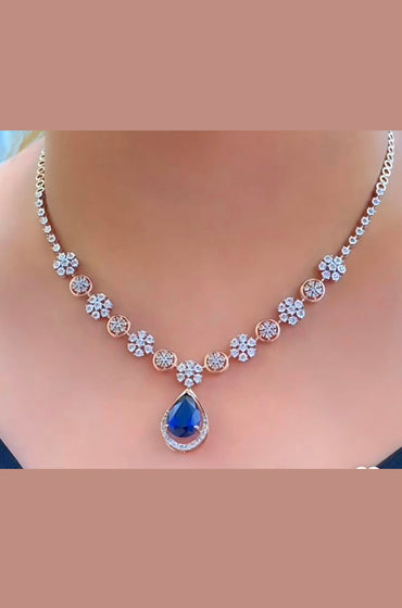 Elegant Pear-Cut Sapphire & Diamond Halo Necklace
