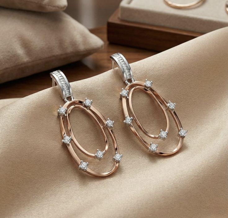 Two-tone geometric drop/dangle earrings.