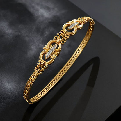 Elegant Filigree Gold Bangle with Diamond Accents