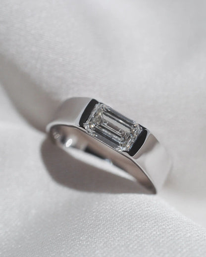 Sleek Emerald-Cut Diamond East-West Bezel Band