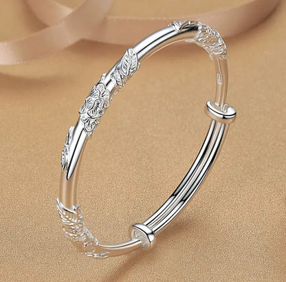 Elegantly Handcrafted Floral Silver Bangle