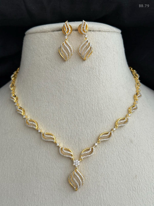 Elegant Dual-Tone Wave Pendant Necklace & Earring Set