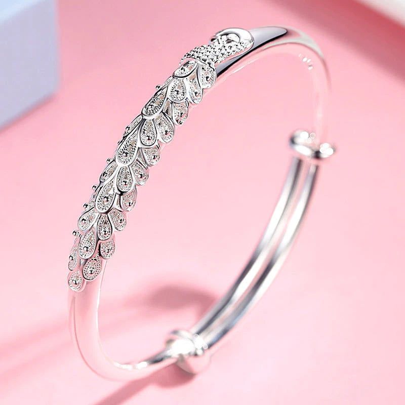 🦚 Elegant Silver Peacock Feather Adjustable Bangle