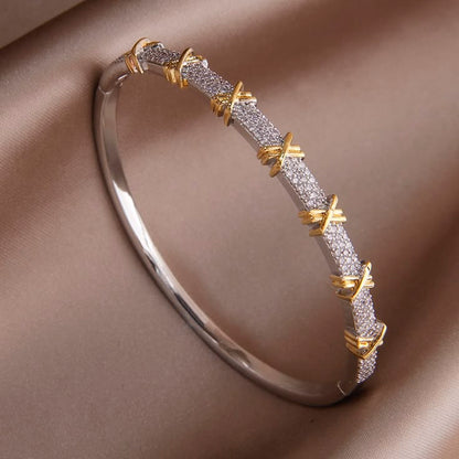 Elegant Two-Tone Criss-Cross Bangle Bracelet