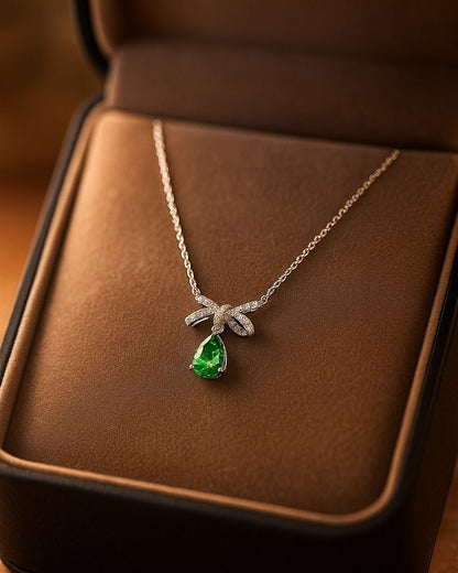 Elegant Pear-Cut Emerald Ribbon Necklace