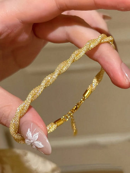 Sparkling Gold Twisted Bangle-Style Bracelet