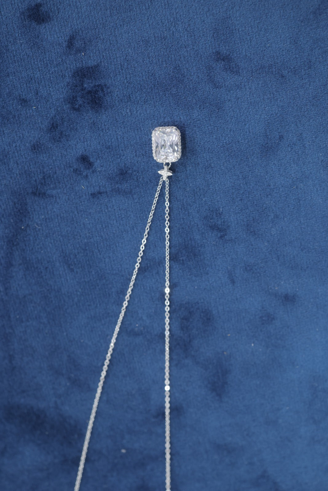 An elegant, classic halo pendant necklace.