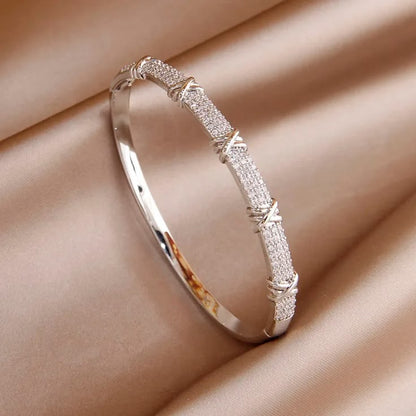 Elegant Cross-Motif Diamond Pavé Bangle Bracelet