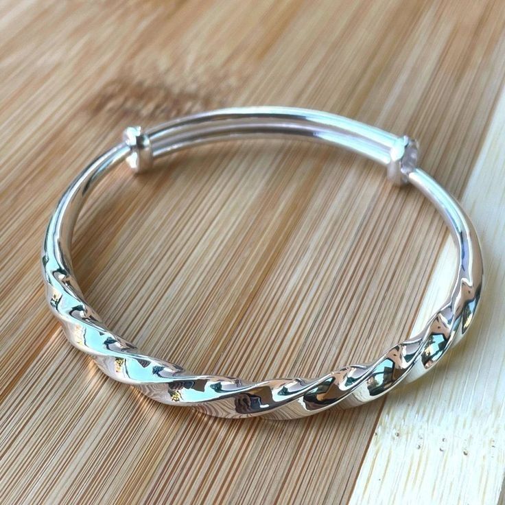 Elegant Twisted Sterling Silver Adjustable Bangle