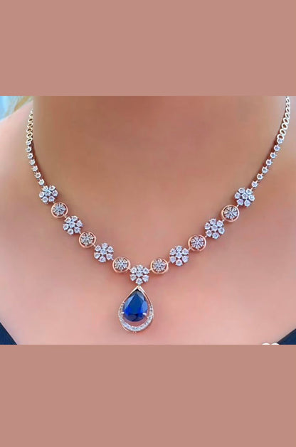 Elegant Pear-Cut Sapphire & Diamond Halo Necklace