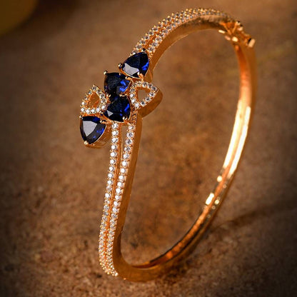 Elegant Rose Gold Finish Blue Sapphire Bangle Bracelet