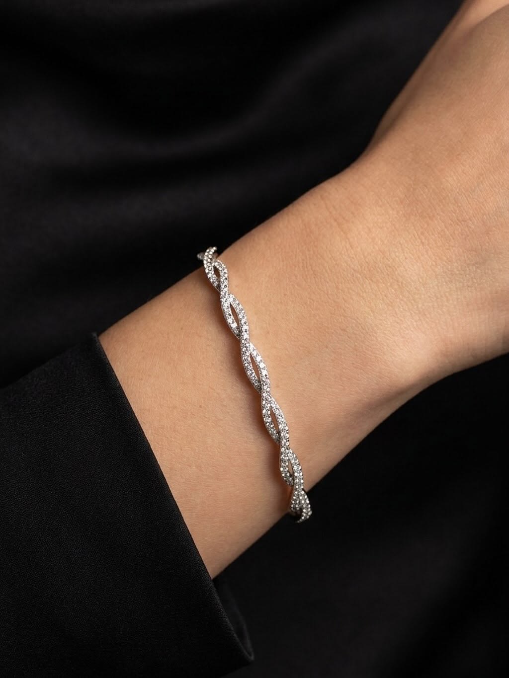 Elegant Twisted Pave Eternity Bangle