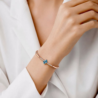 Diagonal Emerald-Cut Blue Gemstone Rose Gold Bar Bracelet