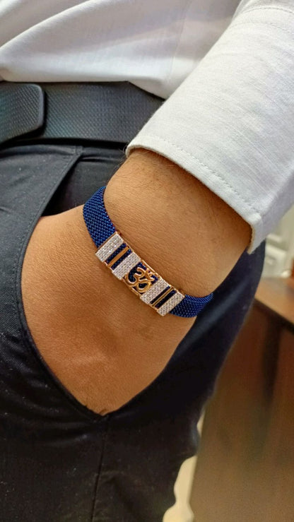 Blue Mesh Bracelet with Gold-Tone & Diamond-Studded "Om" Motif